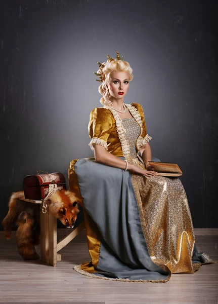 Picture of beautiful haughty queen in royal dress — Stock Photo, Image