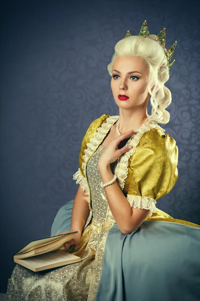 Picture of beautiful haughty queen in royal dress — Stock Photo, Image