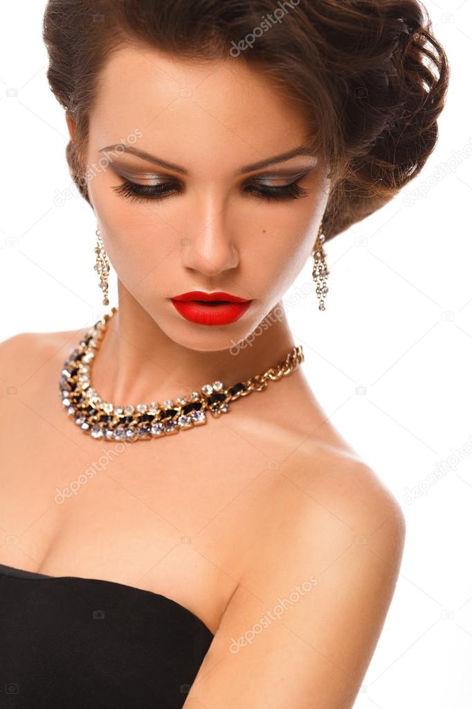 Beauty Woman with Perfect Makeup and luxury accessories.