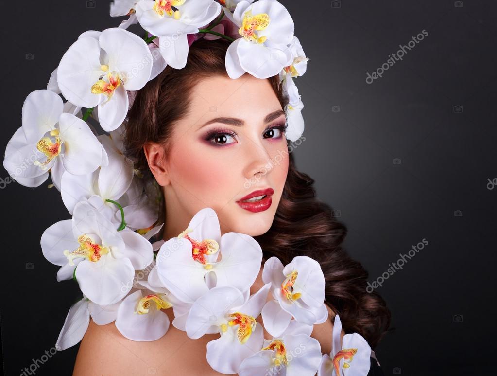 Fashion Beauty Model Girl with Orchid Flowers Hair. Bouquet of Beautiful Flowers on lady's head. Stock Photo by ©nn-poter 64430859 Fashion Beauty Model Girl with Orchid Flowers Hair. Bouquet of Beautiful Flowers on lady's head. Stock Photo by ©nn-poter 64430859