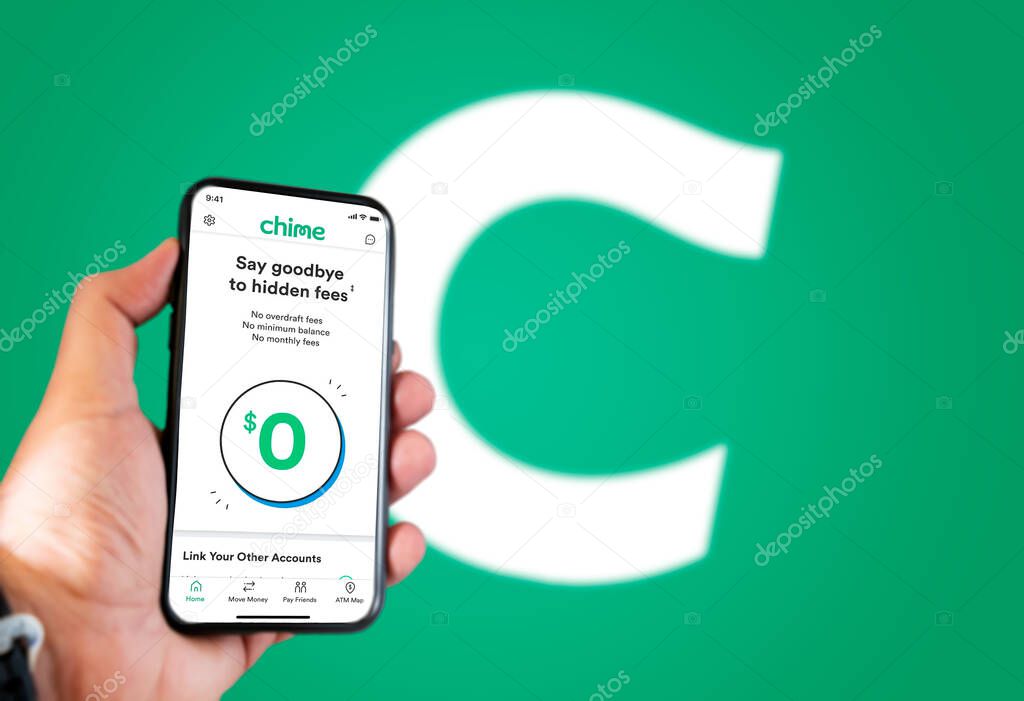 San Francisco, Ca, USA, May 2021: A hand holding a phone with the Chime app on the screen. Chime is an American financial technology company which provides fee-free mobile banking services