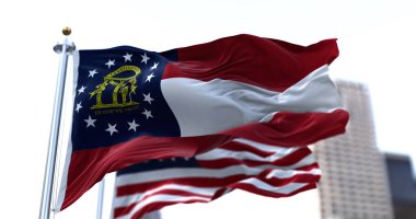 ABD 'nin Georgia eyaletinin bayrağı rüzgarda dalgalanırken arka planda Amerikan yıldızları ve çizgileri belirsizleşti. 2 Ocak 1788 'de Gürcistan, Birliğe katılan dördüncü devlet oldu.