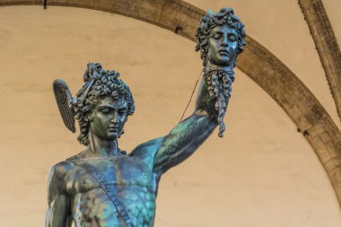 Perseus hanging the head of Medusa