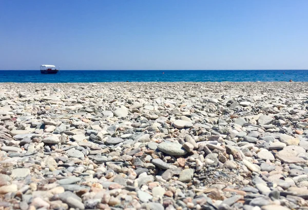 Boat, sea and stones — Stock Photo, Image