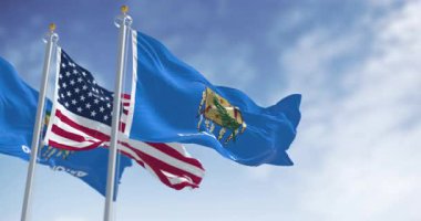 Amerikan bayrağını sallayan Oklahoma eyaleti bayrağı. Oklahoma, ABD 'nin Güney Orta Bölgesi' nde bulunan bir eyalettir. Kusursuz 3 boyutlu animasyon. Yavaş çekim döngüsü. Seçici odak
