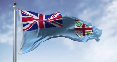 Açık bir günde Ulusal FIji bayrağı sallanıyor. Fiji, Melanezya 'da Güney Pasifik Okyanusu' nun bir parçası olan bir ada ülkesidir. Kusursuz 3 boyutlu animasyon. Yavaş çekim döngüsü. Seçici odak