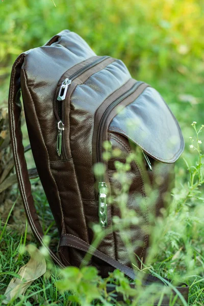 Dark Coffee Colored Leather Multifunctional Travel Bag Wild Green Grass — Stock Photo, Image
