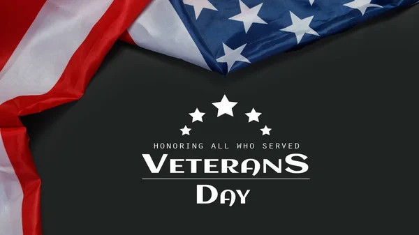 Happy Veterans Day. American flags with the text thank you veterans against a black background. November 11.