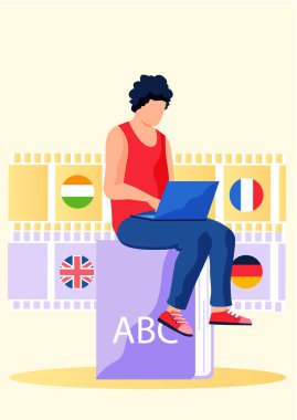 Yabancı dil öğreniyorum. Bir erkek öğrenci dizüstü bilgisayarla öğretmenine mesaj yazıyor.