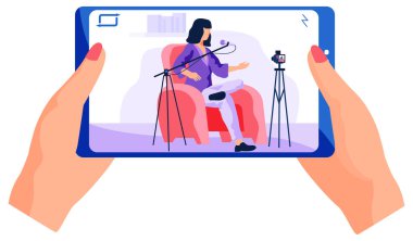 Kız videoyu telefonundan izliyor. Videodaki kadın kameraya yeni bir şarkı kaydediyor.