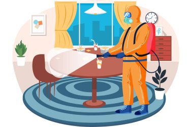 Salgın hastalıklar servisinden bir adam oturma odasında virüs ve bakterileri öldürmek için dezenfeksiyon yapıyor.