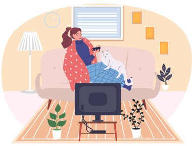 Karantina sırasında çay içen hasta kadın. Kız kendini soyutlamış kediyi okşuyor kanepede oturuyor