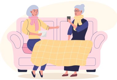 Teknolojilerle çalışan yaşlı kadınlar. Akıllı telefon ve tabletle kanepede oturan kız arkadaşlar.