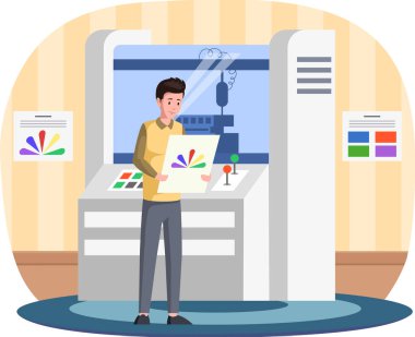 Man in typography choosing color from paint palette. Guy near professional equipment for print house