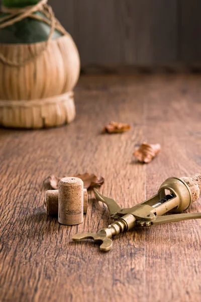 Old corkscrew with fiasco — Stock Photo, Image
