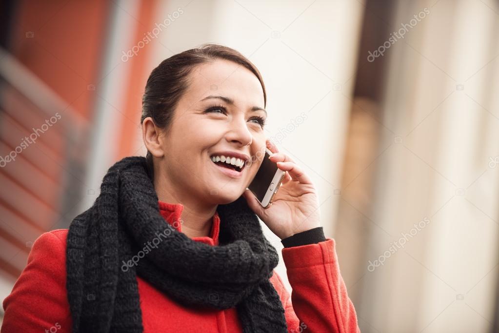 Smiling woman in the street