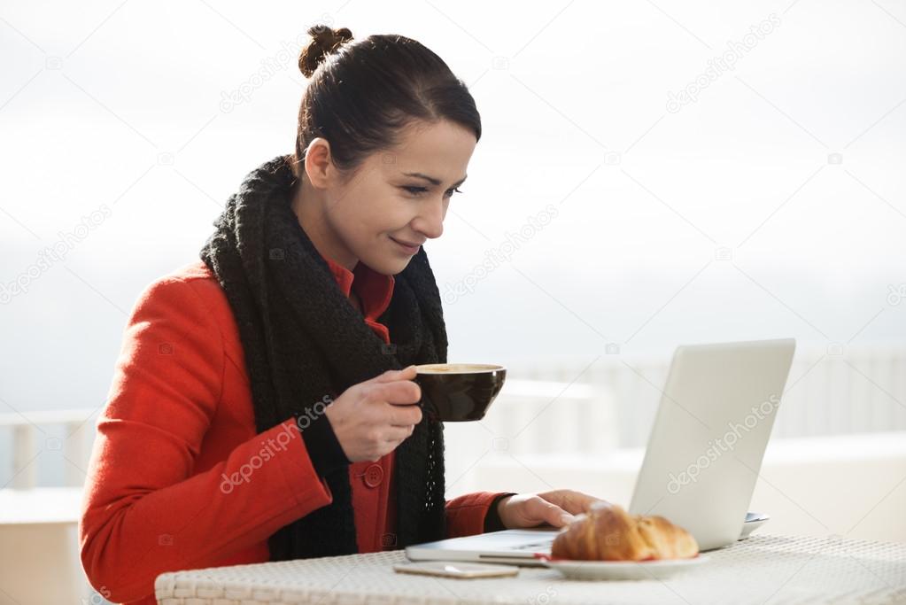 Attractive woman working on her computer