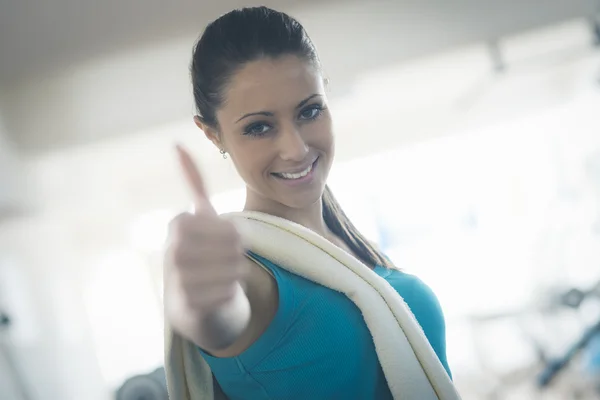 Attractive young woman at gym — Stock Photo, Image