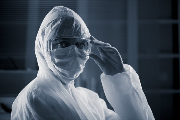Researcher in hazmat suit