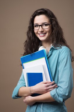 Güzel genç öğrenci poz