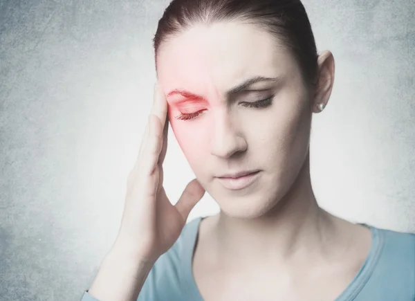 Woman with headache — Stock Photo, Image