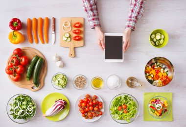 Online cooking app with kitchen worktop clipart
