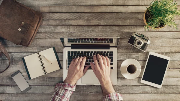 Hipster desktop with male hands — Stock Photo, Image