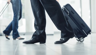 Passengers moving with luggage