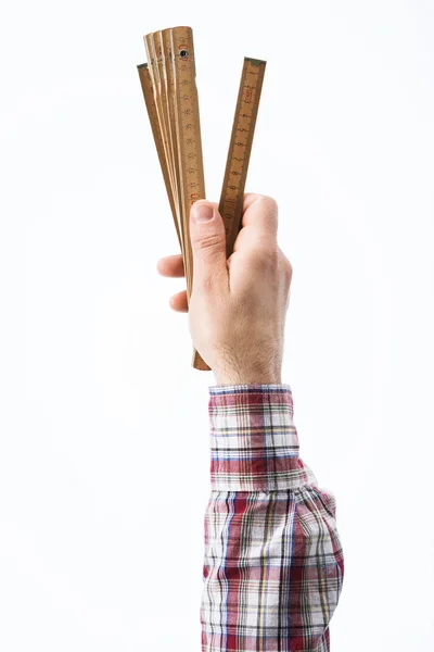 Hand hält ein Zollstock — Stockfoto