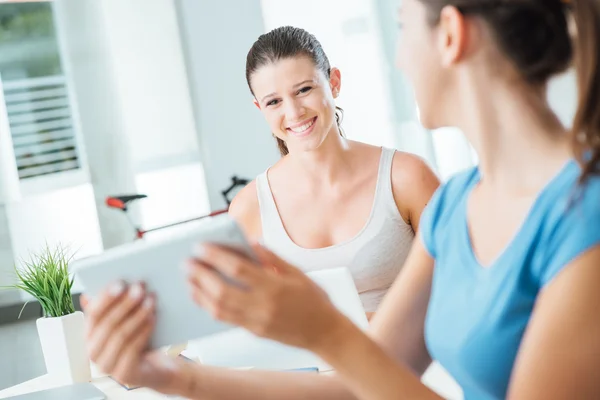 Girls using new technologies at home — Stock Photo, Image