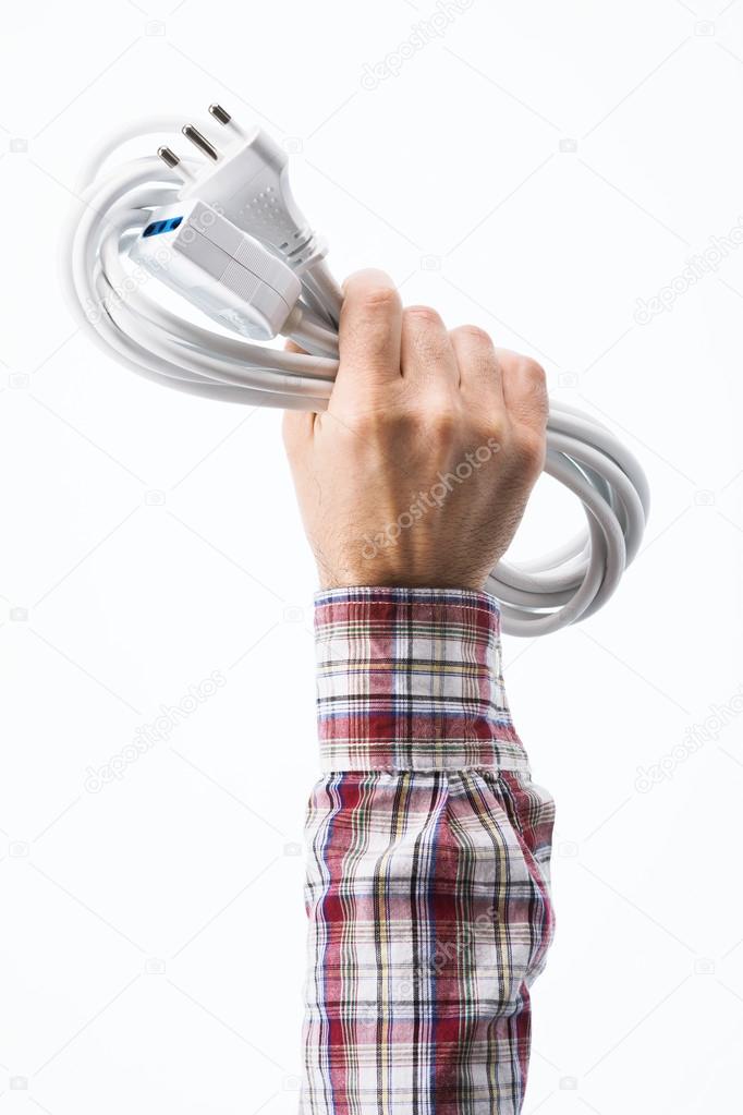 Hand holding a power cable
