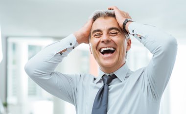 Cheerful businessman laughing clipart