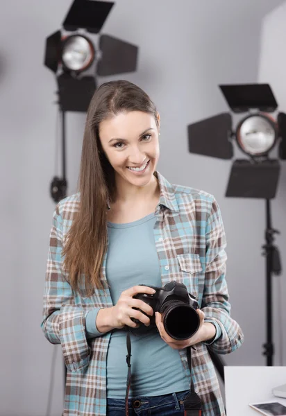 Photographer posing in a professional studio — Stock Photo, Image