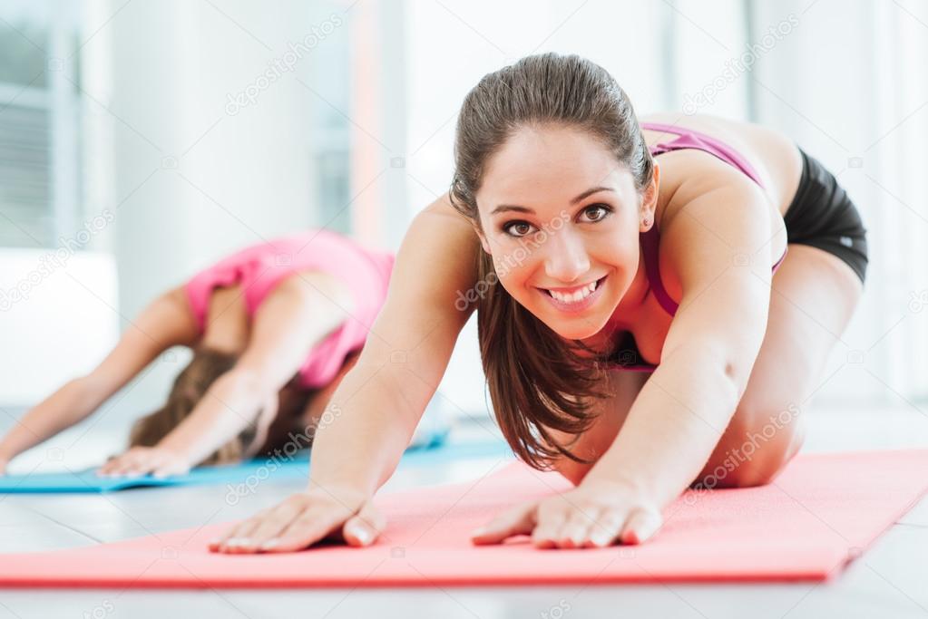 Girls doing stretching exercises