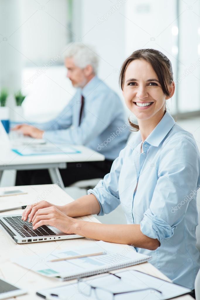 Smiling business woman at work