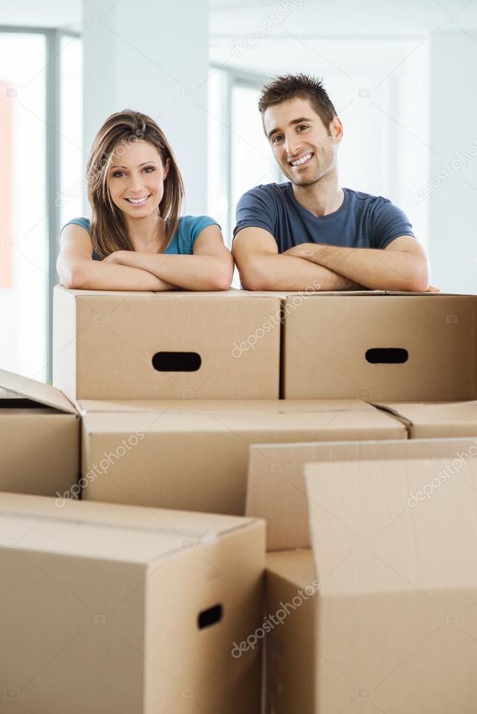 Young couple moving in their new home