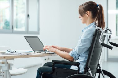 Young disabled businesswoman at work clipart