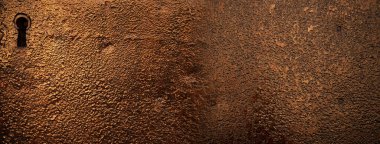 anahtar deliği afiş arka planına sahip rustik metal duvarın kaba dokusu