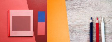 three blue red white color pencil with color notebook and colorful pink paper on wood banner creative business background