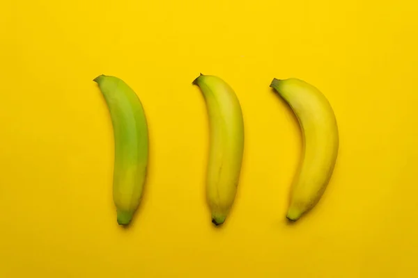 Colorful Three Green Yellow Banana Maturing Process Fruit Food Background — Stok fotoğraf