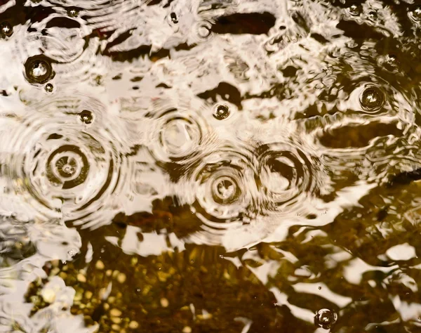 Desfoque gota de água no fundo da superfície — Fotografia de Stock