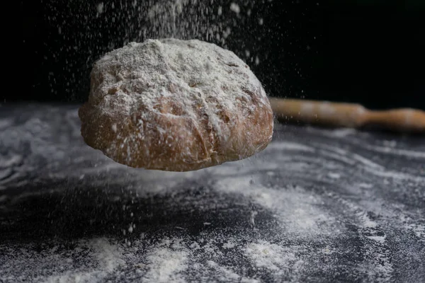 Bread Flying Flour Splash Floury Black Table Creative Concept Bakery — Stock Photo, Image