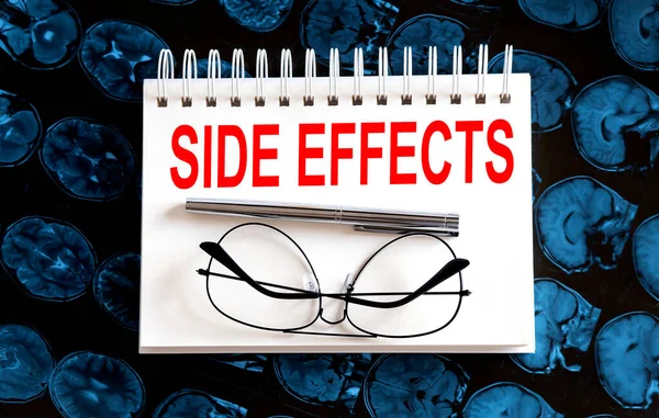 Text SIDE EFFECTS on a mri background.Medical concept.