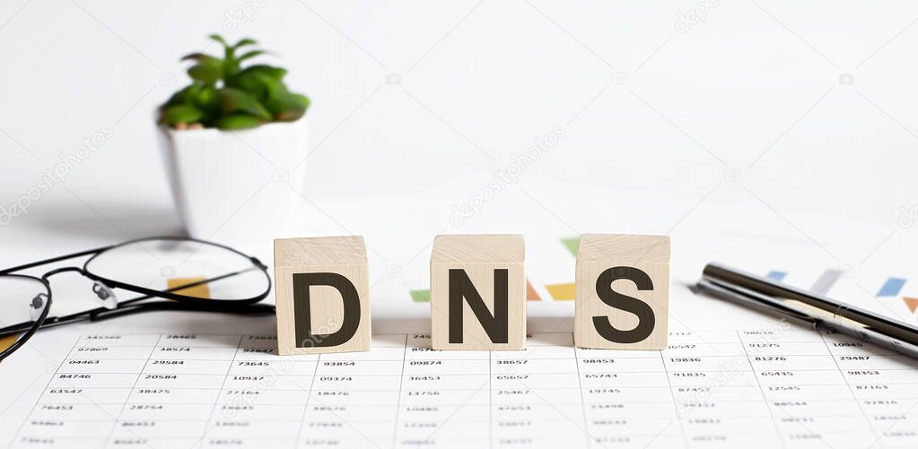 DNS - Acronym Domain Name System concept on the cubes
