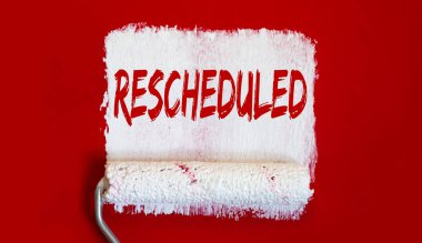 Rescheduled .One open can of paint with white brush on red background. clipart