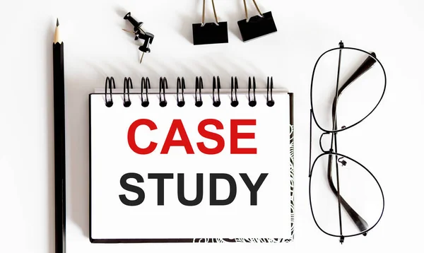 Case study memo written on a notebook with pen