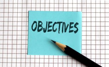 OBJECTIVES, bu ifade renkli çıkartmalara, not defterine yazılır. İş konsepti
