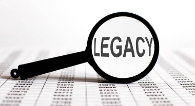 Grafik arka planında metin LEGACY ile büyüteç