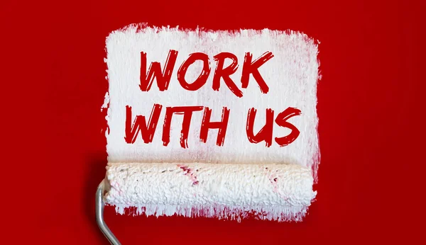 Work With Us .One open can of paint with white brush on red background.