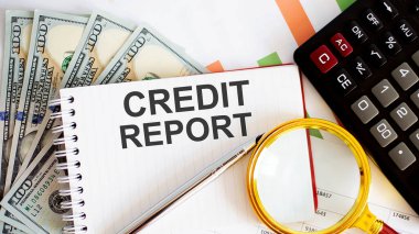 Kelime yazma Kredi Raporu. Çizelge, dolar ve ofis araçlarıyla iş kavramı